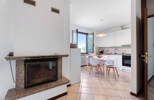 Angera House | Holiday Home 'Villa Fox' with Garden, Balcony and Shared Wi-Fi