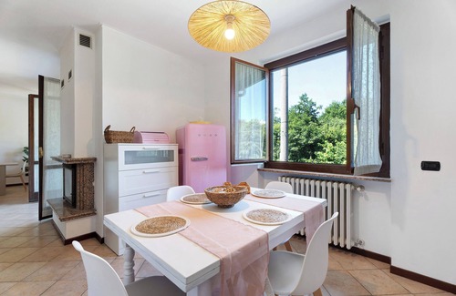 Angera House | Holiday Home 'Villa Fox' with Garden, Balcony and Shared Wi-Fi