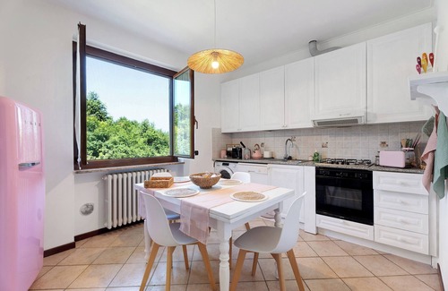 Angera House | Holiday Home 'Villa Fox' with Garden, Balcony and Shared Wi-Fi
