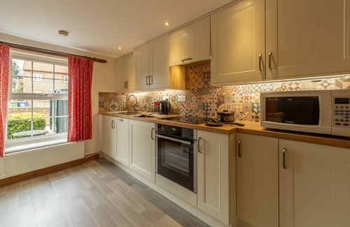 Docking Cottage | Hollyhocks, Docking, Norfolk