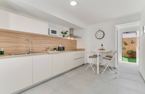 Vecindario Apartment | Home2Book Quiet Retreat with Patio & Roof Access