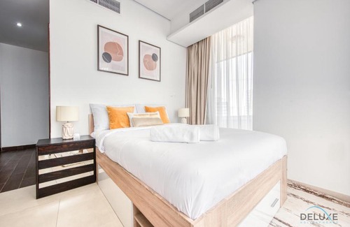 Dubai Sports City Apartment | Homely 1BR at The Matrix Dubai Sports City by Deluxe Holiday Homes