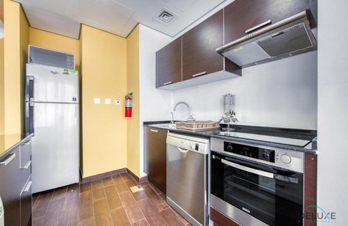 Dubai Sports City Apartment | Homely 1BR at The Matrix Dubai Sports City by Deluxe Holiday Homes