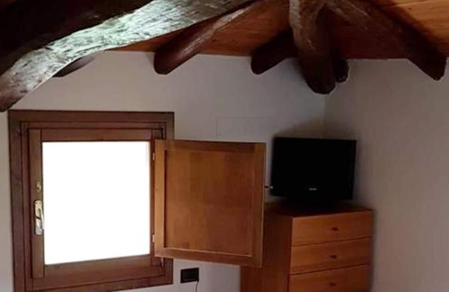Monte San Pietro Apartment | Homerez - Apartement for 4 ppl. with shared pool and spa at Monte San Pietro