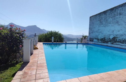 Zahara de la Sierra House | Homerez - Beautiful house for 4 ppl. with shared pool at Zahara de la Sierra