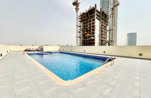 Jumeirah Village Triangle Apartment | Homes2Retreat - Modern Studio with Balcony in JVT
