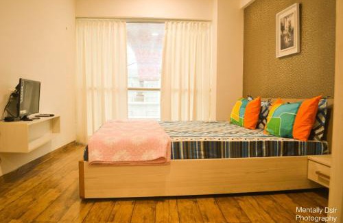 Dumas Apartment | Homestays at Rajhans BELLIZA Near Airport