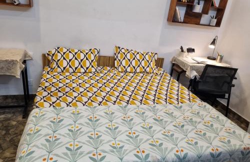 Bullawala Apartment | HOmeTEL-1 Bedroom Bath n kitchen Studio Apartment By Pushpanjali QLH