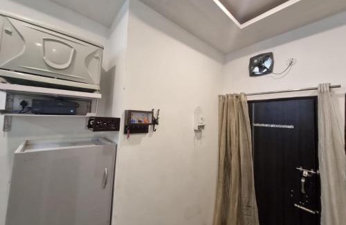 Bullawala Apartment | HOmeTEL-1 Bedroom Bath n kitchen Studio Apartment By Pushpanjali QLH