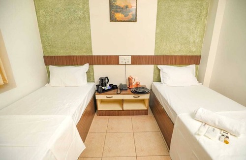 Gandhipuram Hotel | Hotel Sapthagiri Nest