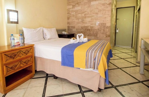 Merida Municipality Hotel | Hotel-Style Comfort in Downtown Mérida with Pool, Garden & Cultural Vibes