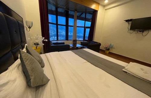 Manali Hotel | HOTEL THE HADIMBA INN -- Studio Rooms -Special For Families, Corporate, Groups, Couples