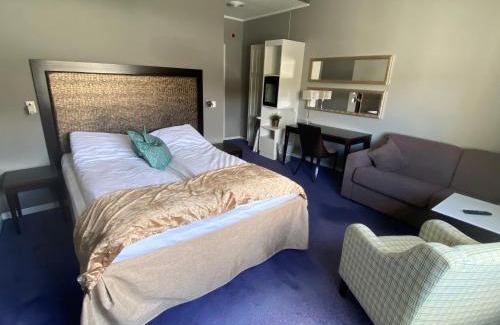 Kyrksaeterora Hotel | Hotell Koselig