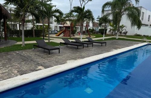 Jimenez House | House in front of the Maya Playa del Carmen train
