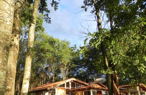 Delfinopolis Cottage | House in the woods, surrounded by the Rio Grande and stunning view of the sunset.