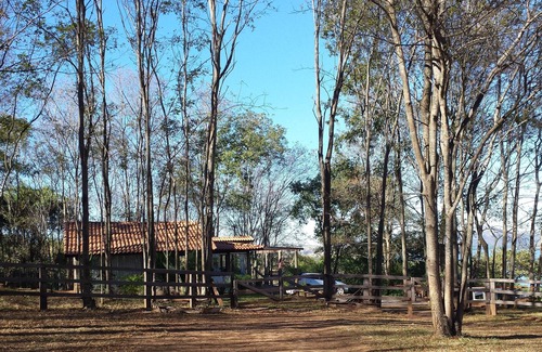 Delfinopolis Cottage | House in the woods, surrounded by the Rio Grande and stunning view of the sunset.