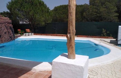 Pozo Del Camino Ski Chalet | House less than 10 minutes from Isla Cristina beach
