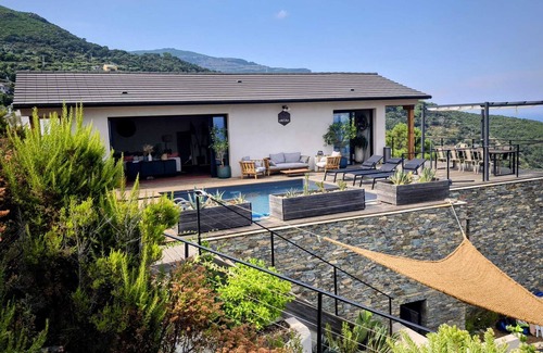 Pozzo Villa | House nestled in the maquis with breathtaking sea views.