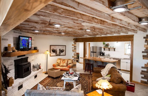 Checotah House | House on the lake with a large sandy beach just steps from the back door.