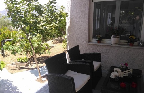 Samos House | House with fruit trees, olive trees, and sea view.