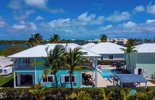 Treasure Cay House | House with Pool, Tiki Bar, and Dock/Boat Slip in Treasure Cay, Abaco