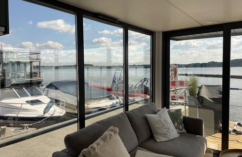Barth Boat Rental | Houseboat Fjord HAVEN with bio-sauna and roof terrace in Barth