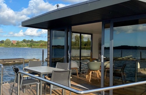 Barth Boat Rental | Houseboat Fjord HAVEN with bio-sauna and roof terrace in Barth
