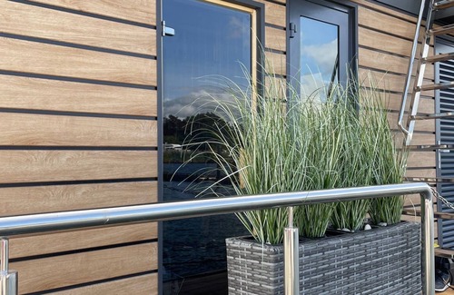 Barth Boat Rental | Houseboat Fjord HAVEN with bio-sauna and roof terrace in Barth