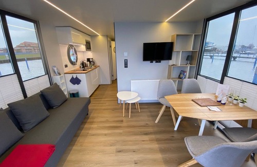 Barth Boat Rental | Houseboat Fjord Vela with bio sauna and roof terrace in Barth