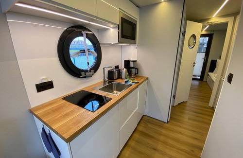 Barth Boat Rental | Houseboat Fjord Vela with bio sauna and roof terrace in Barth