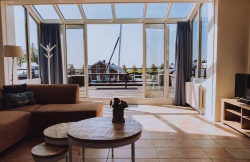 Municipality of Uitgeest Apartment | Houseboat in Waterpark with Private Dock