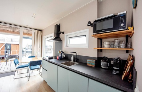 Offingawier Ski Chalet | Houseboat 'Riggelbrug' - Paviljoenwei 4 | Offingawier