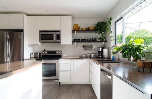 Central Okanagan House | Huge Deck w/Heated Pool + Hot tub. Games Room. Private & Very Clean.