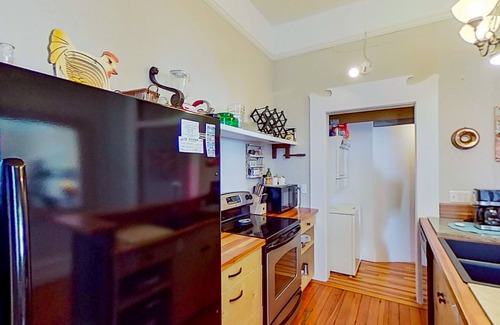Wilmington Historic District Condo | Iconic river-view condo with AC, W/D, & historic charm - dog-friendly