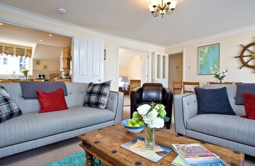 Brixham Apartment | Ideally located on Brixham marina offering far reaching sea views.