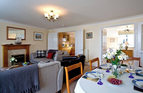 Brixham Apartment | Ideally located on Brixham marina offering far reaching sea views.