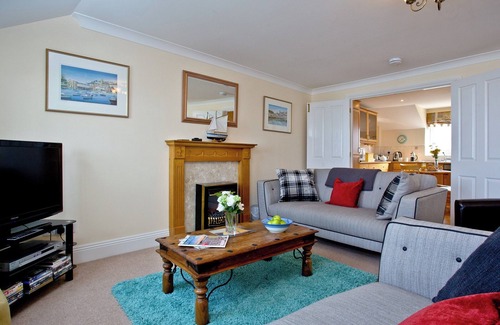 Brixham Apartment | Ideally located on Brixham marina offering far reaching sea views.