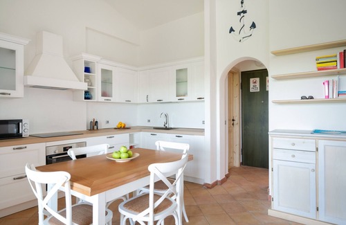 Porto San Paolo Apartment | Il Poggio 8 - flat with shared pool and garden