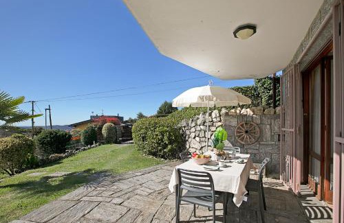 Massino Visconti Apartment | Il Poggio Radioso Lake View & Garden - Happy Rentals