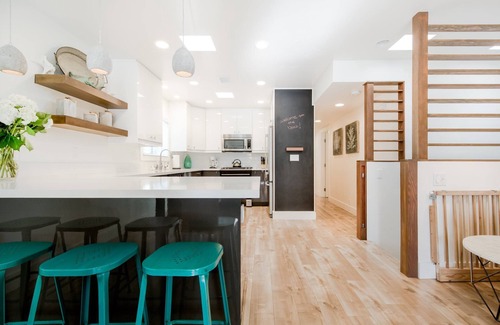 Santa Ana Heights House | Immaculate, beautiful duplex with AC, bikes and beach gear - steps to sand!