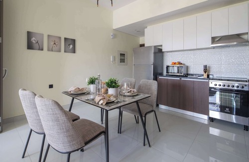 Dubai Apartment | Impressive 1BR with Pool Views in Liwan!