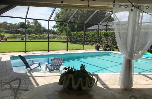 Kings Lake House | In the Heart of Naples, Suite with Lake & Pool