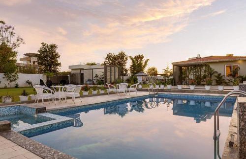 Jaipur District Villa | Inaayat Villa by StayVista - Luxe Retreat with Pool & Garden