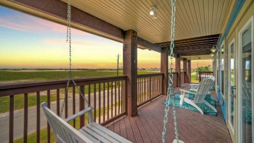 Leeward Sands House | Incredible Nature Views Golf Cart for Rent Balcony Blue Crush by AvantStay