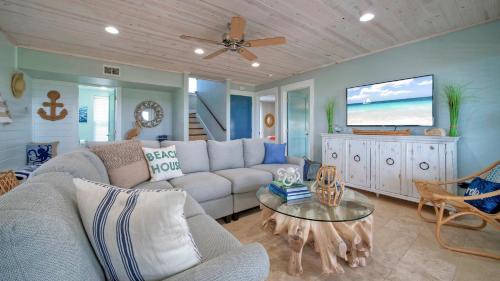 Leeward Sands House | Incredible Nature Views Golf Cart for Rent Balcony Blue Crush by AvantStay