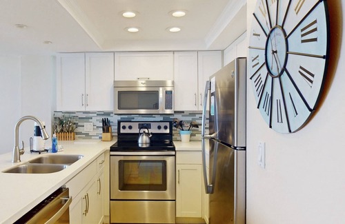 Madeira Beach Condo | Incredible View from Huge, Private Balcony! 2 King Bedrooms, Free Wifi, Upscale Building w/Pool.