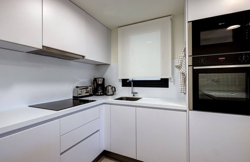 Estepona Apartment | Infinity luxury 2 bedroom apartment with roof top pool gym in Estepona Center