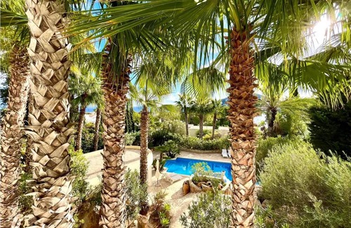 Santa Eulalia del Rio Apartment | Inmitten Eines Mediteranen Gartens, Terrassiert, Befindet Sich das Appartment