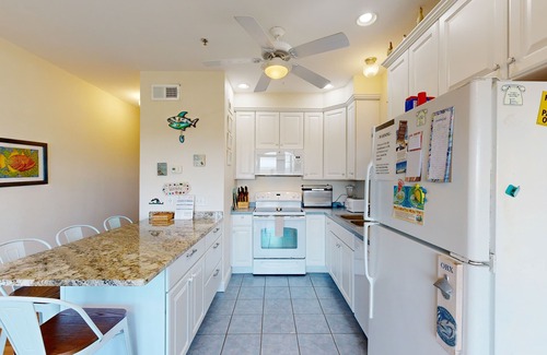 Hatteras Condo | Inviting beachfront condo featuring hot tub & pool, central AC, elevator, & deck