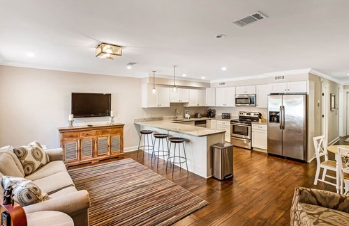 Historic Downtown Savannah Apartment | Inviting Garden Level Condo Near Forsyth Park by Lucky Savannah